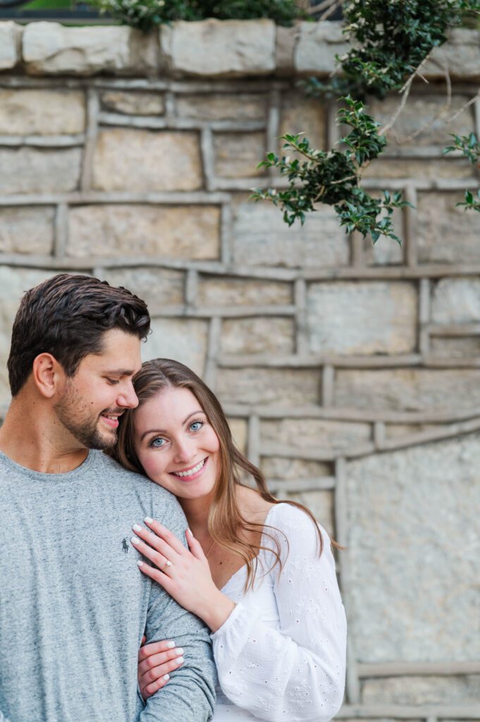 Couple stands together during their engagement session at Anchorage Trail in Louisville, KY