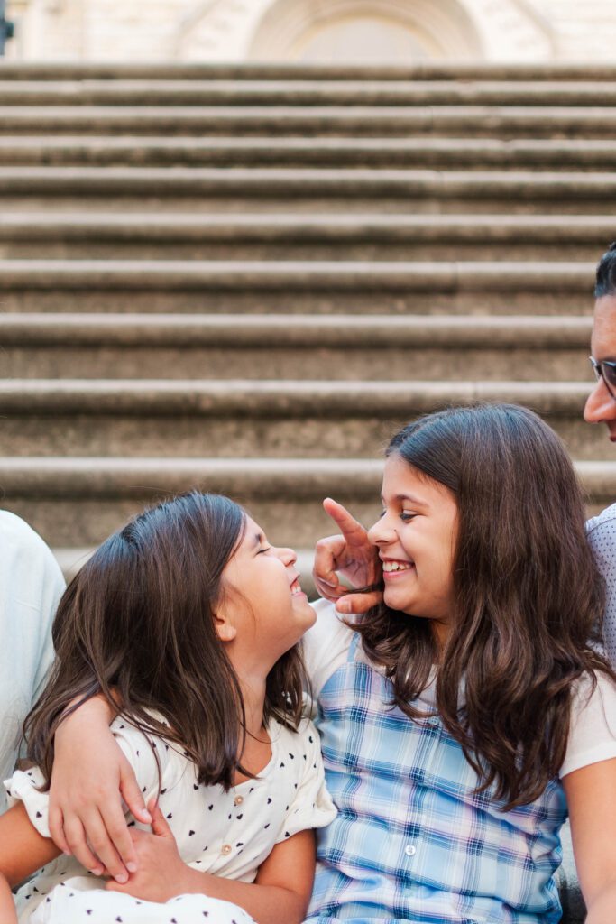 Family plays on steps to the Crescent Hill Reservoir