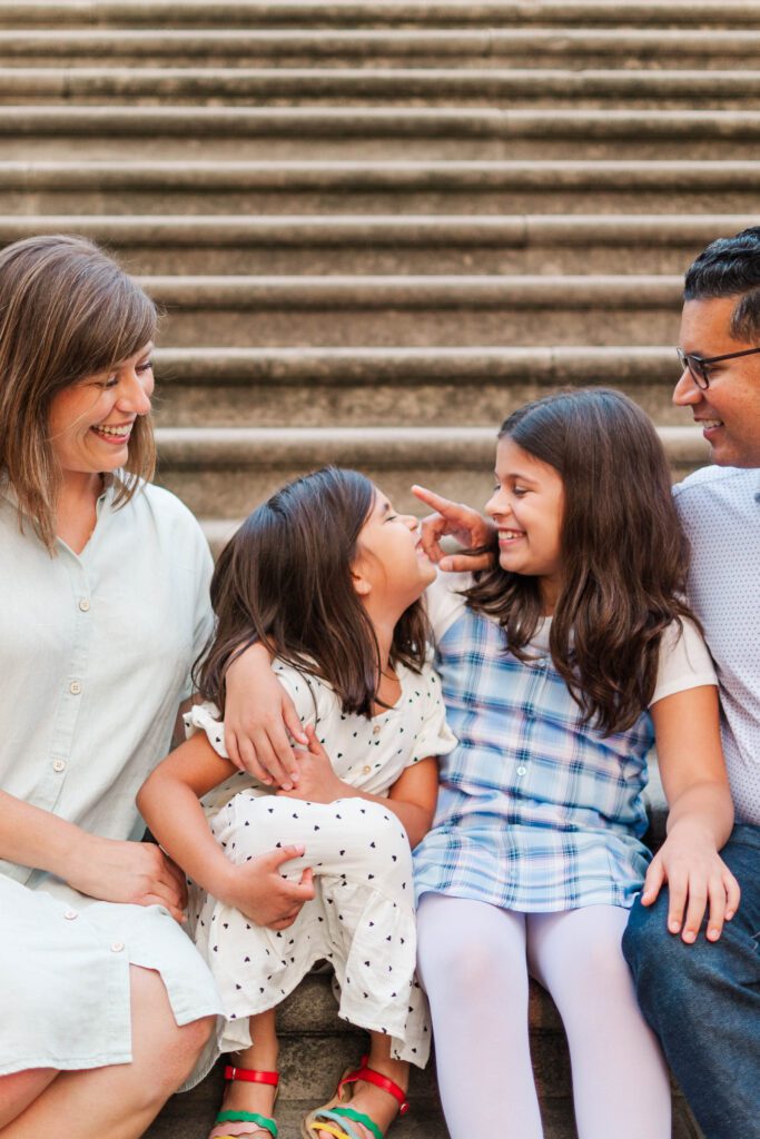 Family plays on steps to the Crescent Hill Reservoir