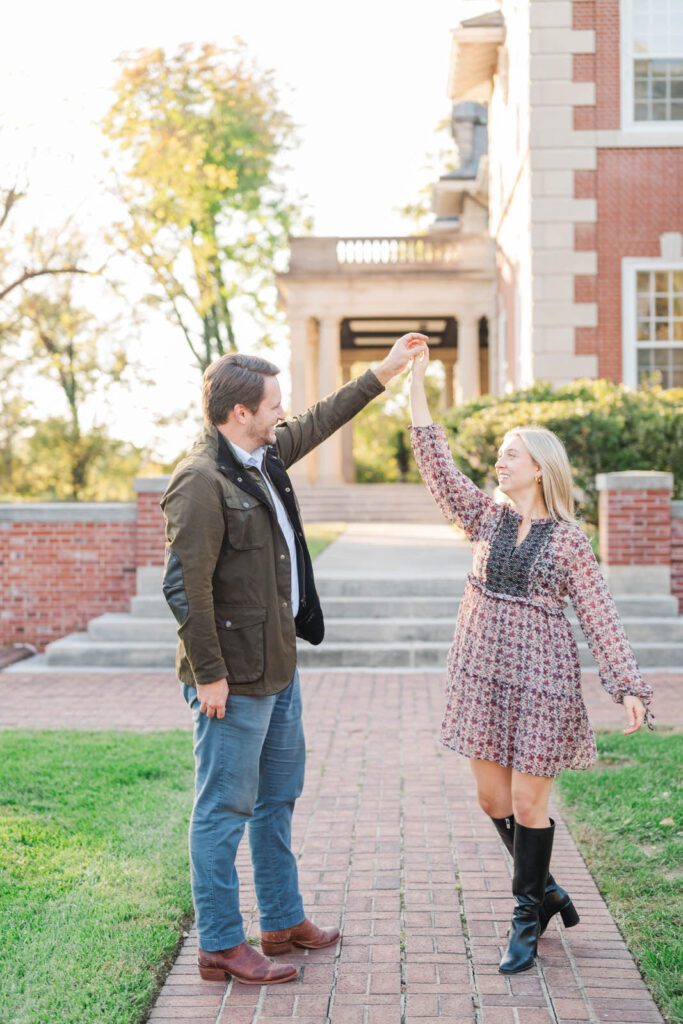 Engaged couple spins at Gardencourt in Louisville for their engagement session.