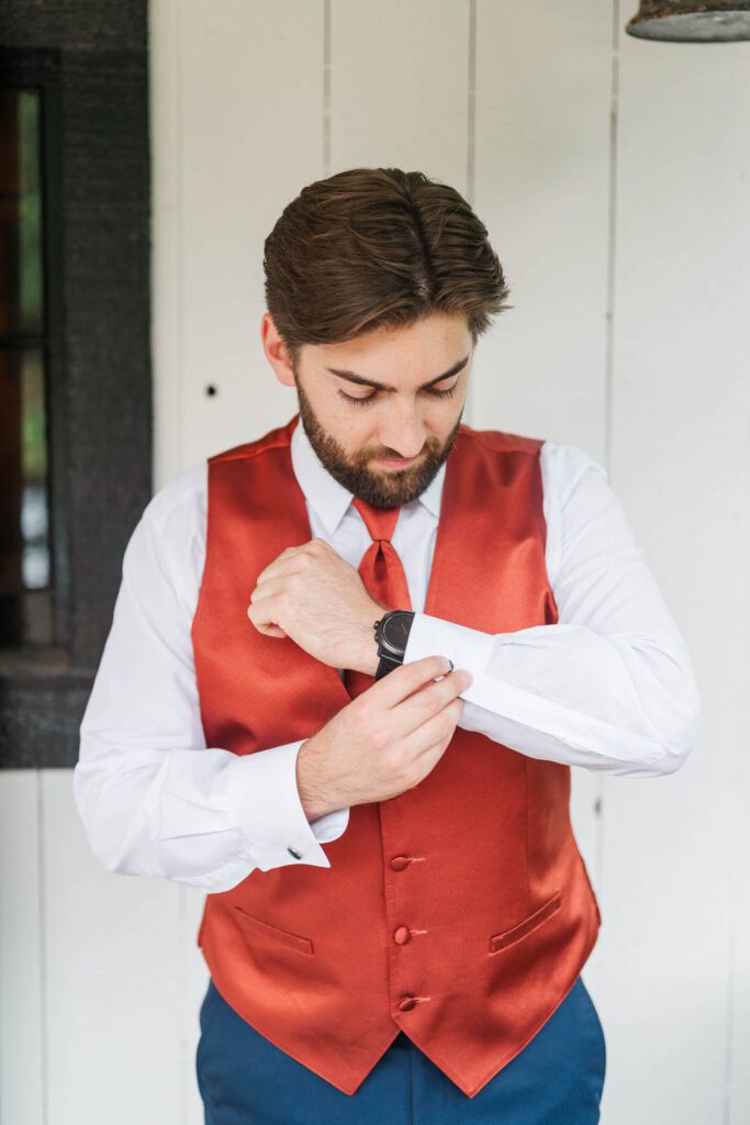 Groom gets ready for his wedding at the Jim Beam Distillery