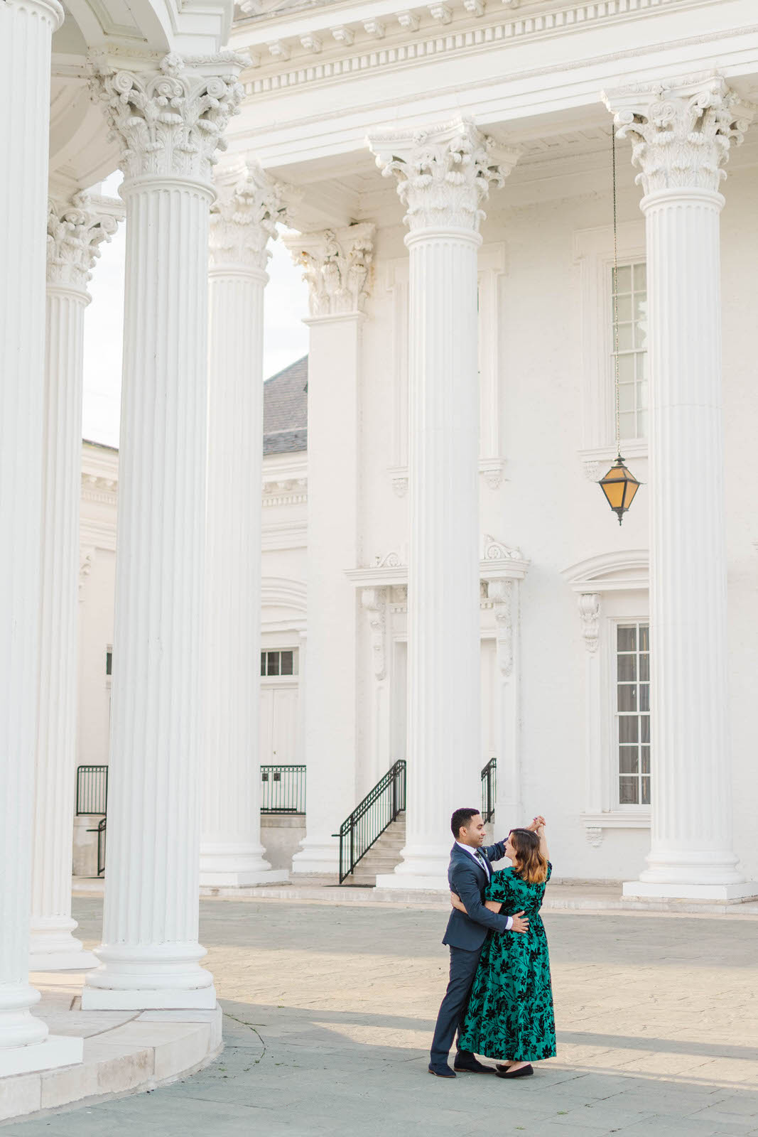 Engaged couple dances at the Louisville Water Tower