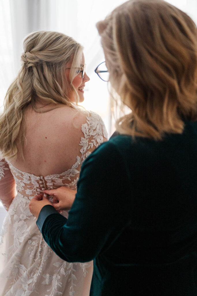 Bride gets ready with her mom for wedding day at The Gatewood in La Grange, KY