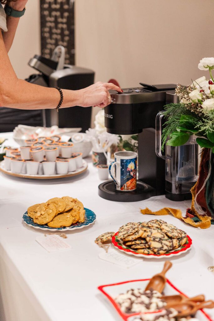 Wedding guest gets a cup of coffee during reception