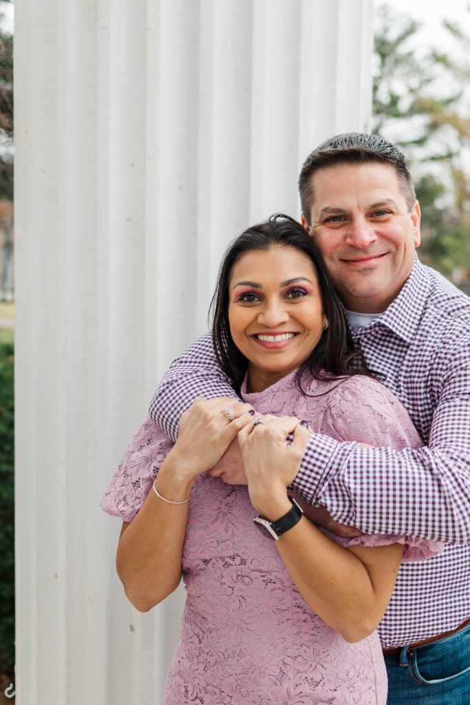 Couple embraces at the Marriott Griffin Gate for their engagement session.