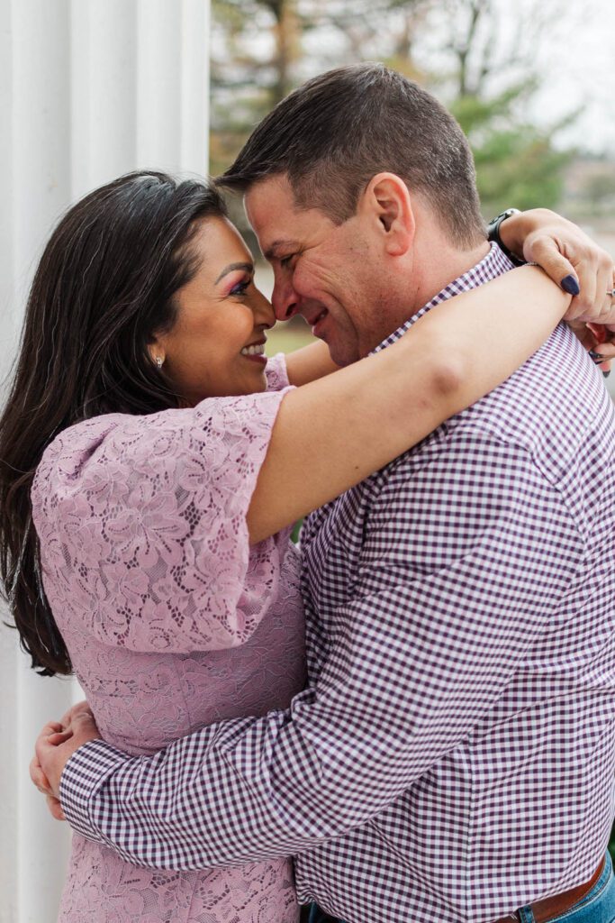 Couple embraces at the Marriott Griffin Gate for their engagement session.