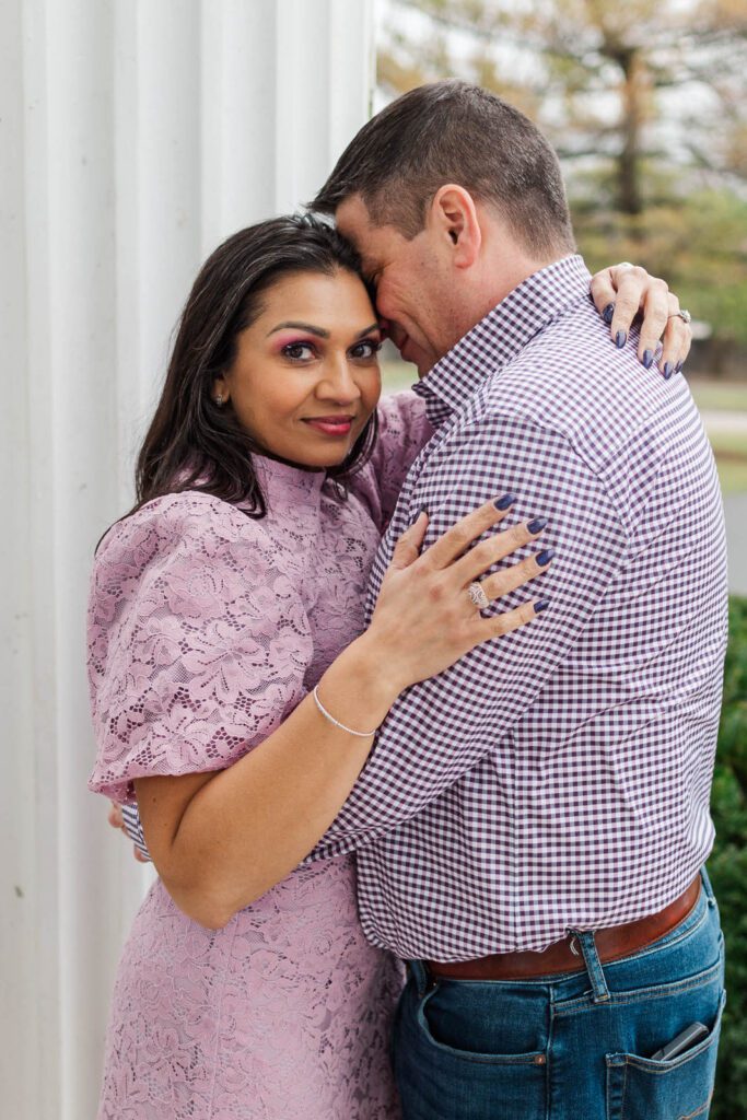 Couple embraces at the Marriott Griffin Gate for their engagement session.