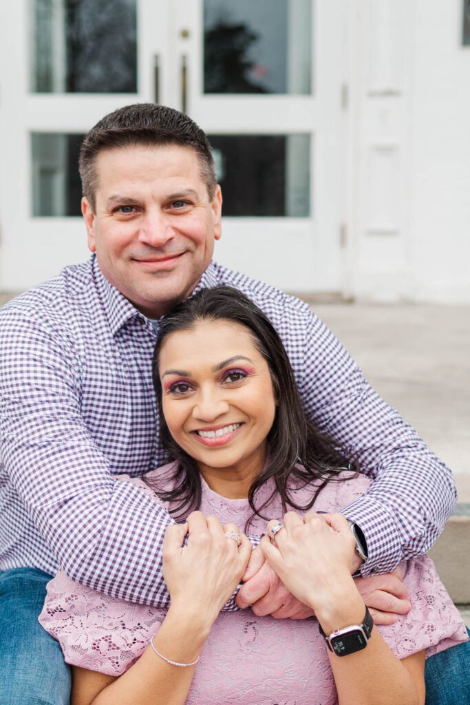 Couple embraces at the Marriott Griffin Gate for their engagement session.