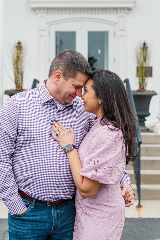 Couple embraces at the Marriott Griffin Gate for their engagement session.