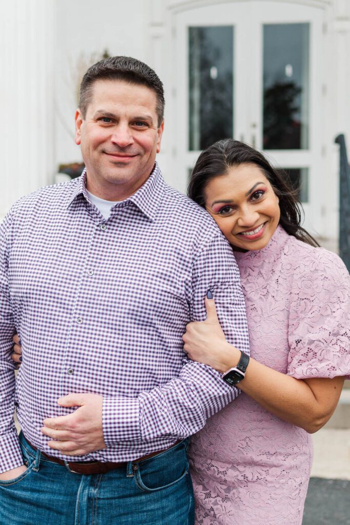 Couple embraces at the Marriott Griffin Gate for their engagement session.