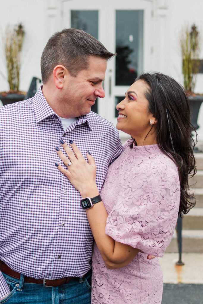 Couple embraces at the Marriott Griffin Gate for their engagement session.