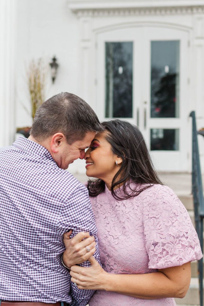 Couple embraces at the Marriott Griffin Gate for their engagement session.