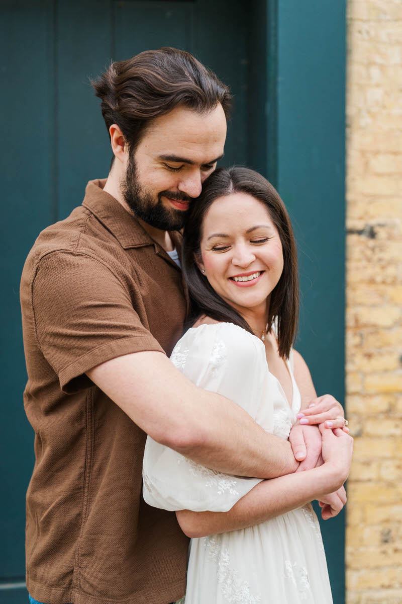 Couple embraces for their engagement session at Ashland, The Henry Clay Estate in Lexington, KY