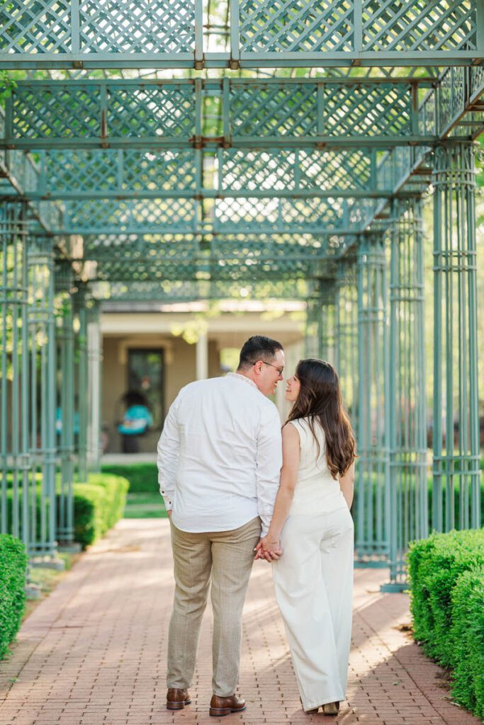 Couple embraces for their engagement session at Norton Commons in Louisville, KY
