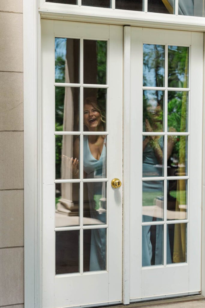 Bridesmaids spying on the first look