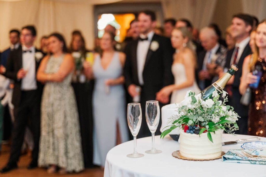 Bride and groom listen to the speeches at their Gardencourt wedding in Louisville, KY
