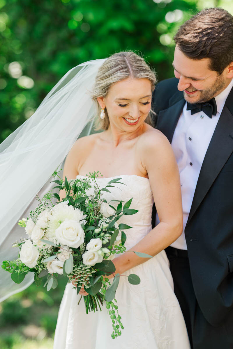 Bride and Groom smile after their first look on their wedding day