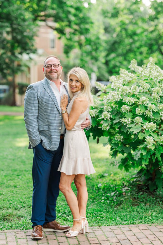 Couple embraces for their engagement session at Gratz Park in Lexington, KY