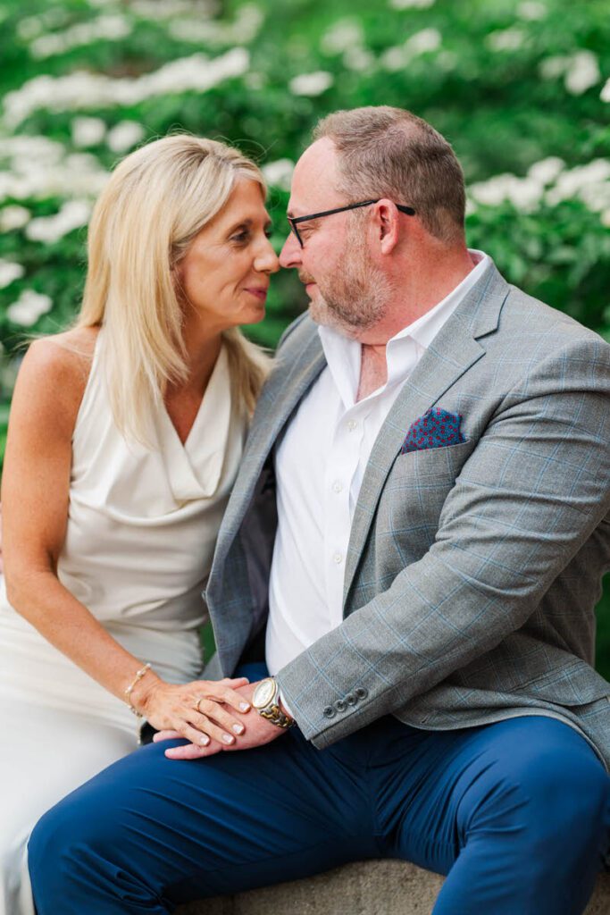 Couple embraces for their engagement session at Gratz Park in Lexington, KY