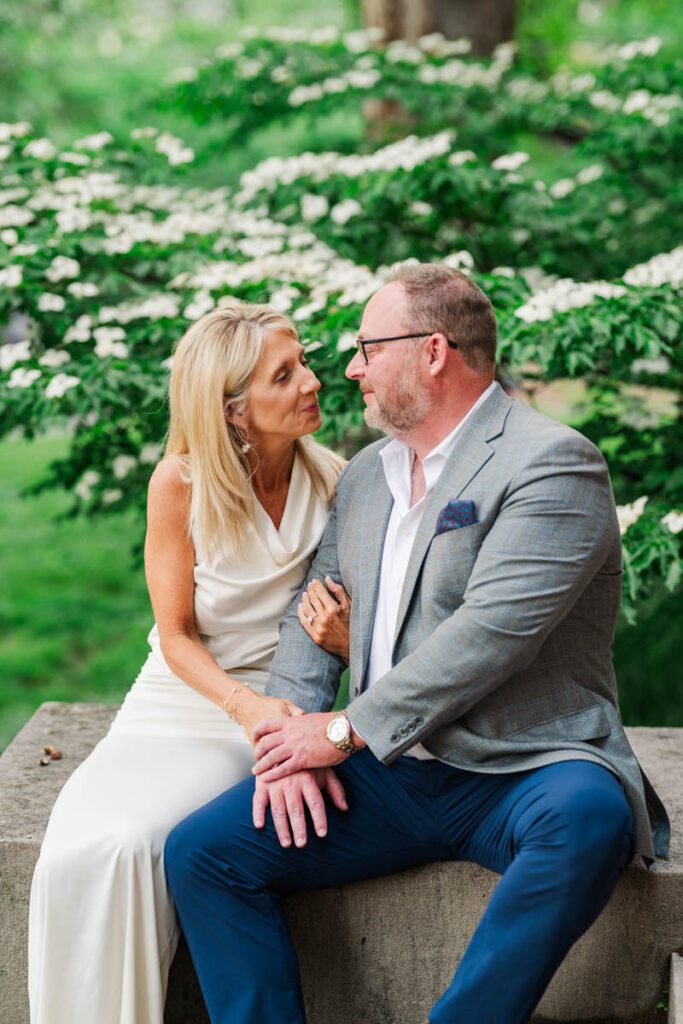 Couple embraces for their engagement session at Gratz Park in Lexington, KY