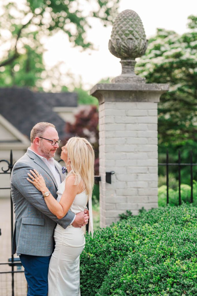 Couple embraces for their engagement session at Gratz Park in Lexington, KY