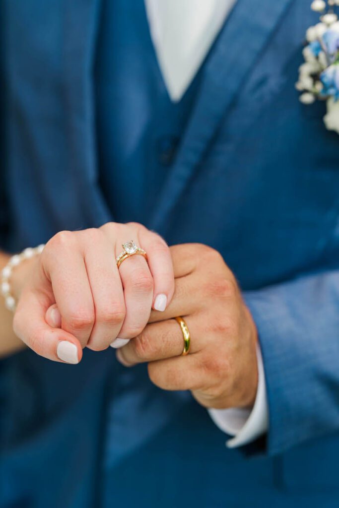 Newlyweds stand together for a portrait at their Gheens Foundation Lodge wedding