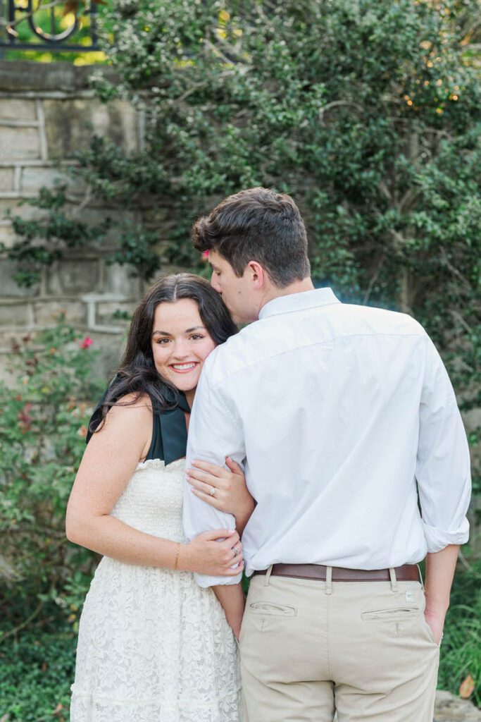 Couple poses at Anchorage Trail for their engagement session