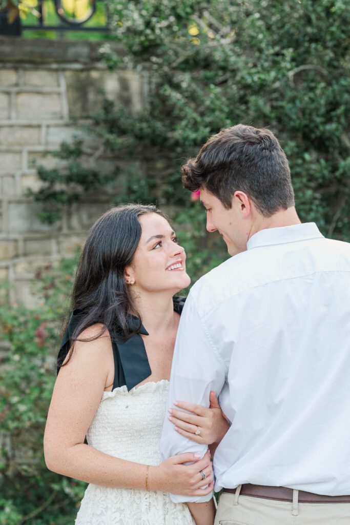 Couple poses at Anchorage Trail for their engagement session