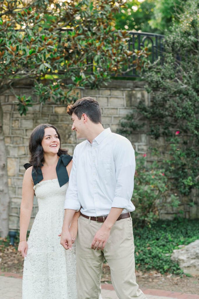 Couple laughs at Anchorage Trail for their engagement session