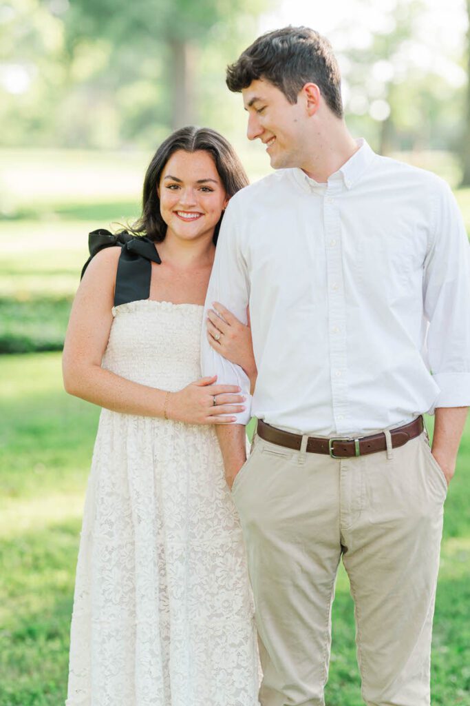 Couple poses at Anchorage Trail for their engagement session