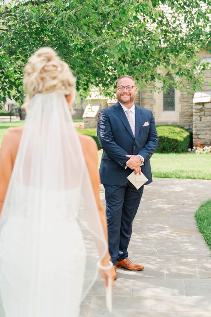 Bride and groom's first look at Duncan Memorial Chapel