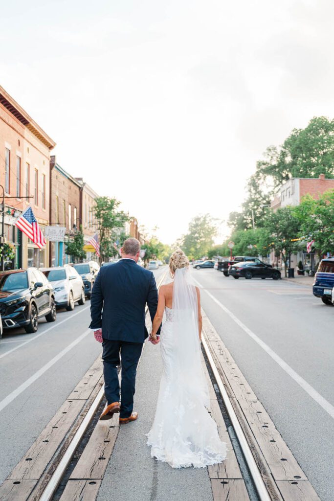 Newlywed portraits outside of The Gatewood in downtown La Grange