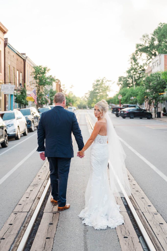 Newlywed portraits outside of The Gatewood in downtown La Grange