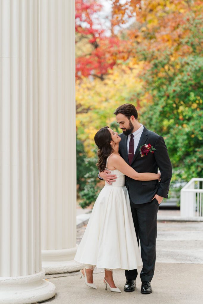 Bride and groom smile at The Bell House for their Lexington wedding day.