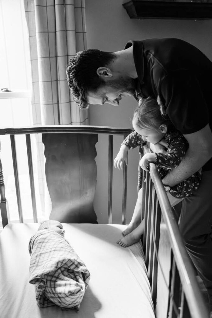 A black and white image of a small family with their newborn baby and toddler.

Louisville In-Home Newborn Photographer

Michelle Bordenkircher Photography
