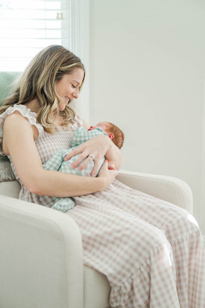 A mom smiles at her newborn son in her arms. 

Louisville In-Home Newborn Photographer

Michelle Bordenkircher Photography