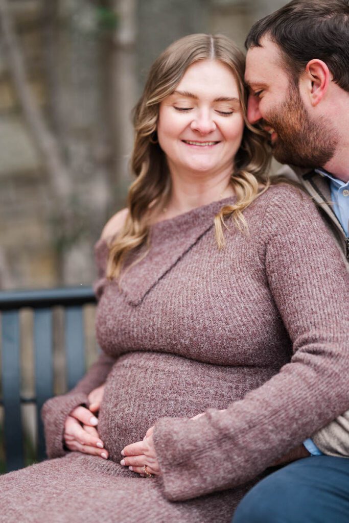 A mom and dad to be snuggle in to stay warm during a Louisville winter maternity session at Anchorage Trail.

Michelle Bordenkircher Photography