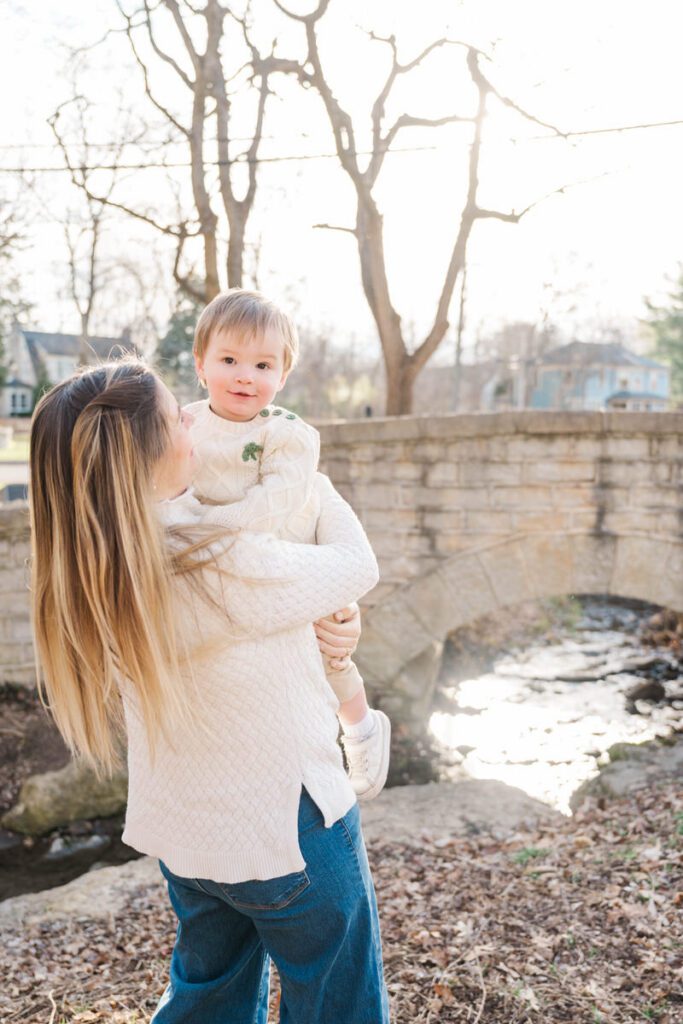 A mom poses with her toddler during a family session at Anchorage Trail in Louisville, KY

Photos by Michelle Bordenkircher Photography