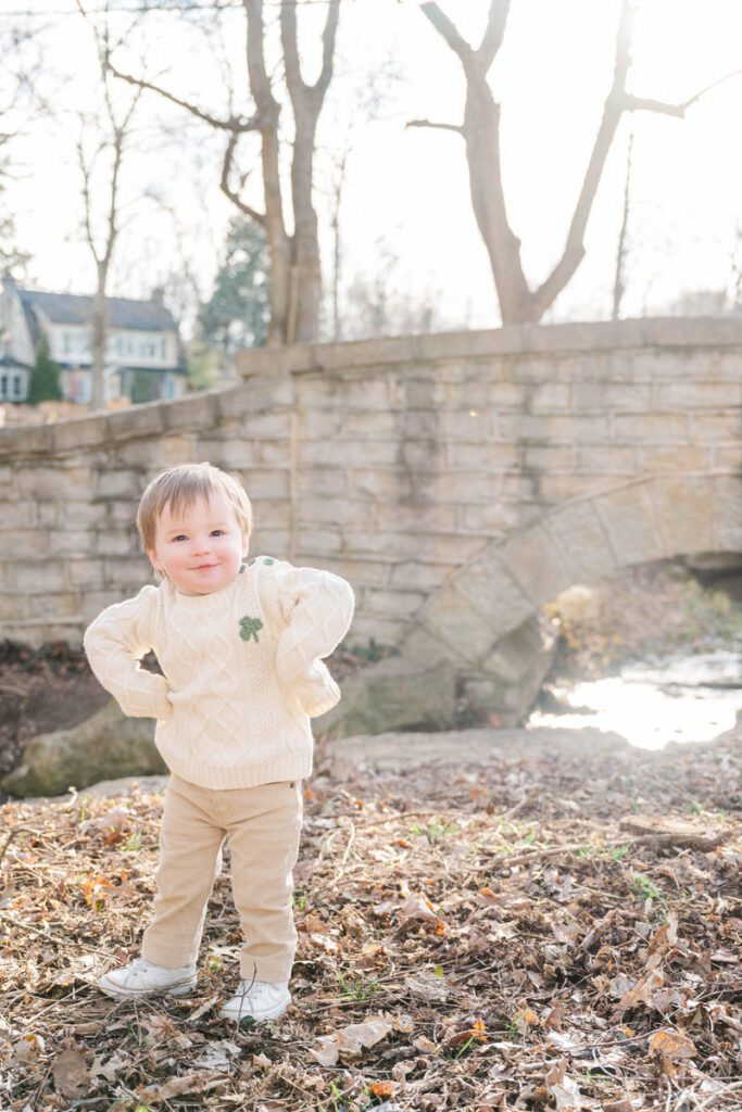 A toddler poses playfully during a family session at Anchorage Trail in Louisville, KY

Photos by Michelle Bordenkircher Photography