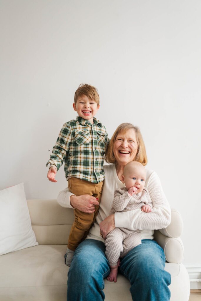 A grandmother poses while holding her grandchildren.
Louisville Motherhood Photographer
Photos by Michelle Bordenkircher Photography