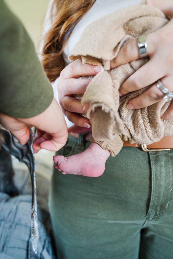A sweet detail image of baby boy's feet during his Louisville In-Home newborn session Photos by Michelle Bordenkircher Photography