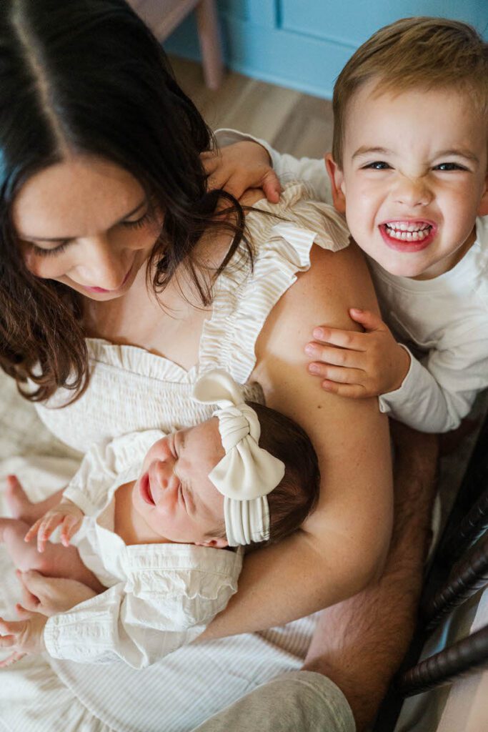 A big brother smiles toward the camera during a Louisville In-Home Family Photography Session. 

Photos by Michelle Bordenkircher Photography.