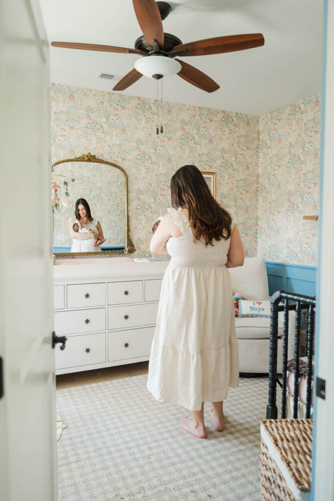 A mom holds her newborn in the nursery during a Louisville In-Home Family Photography Session. 

Photos by Michelle Bordenkircher Photography.
